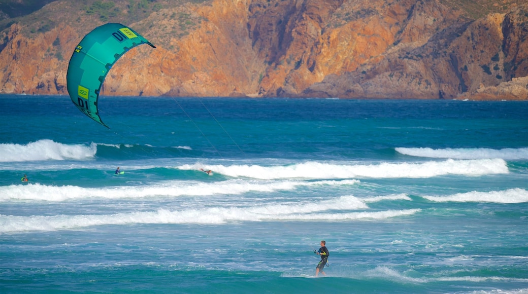 Guincho Beach showing kite surfing, waves and general coastal views