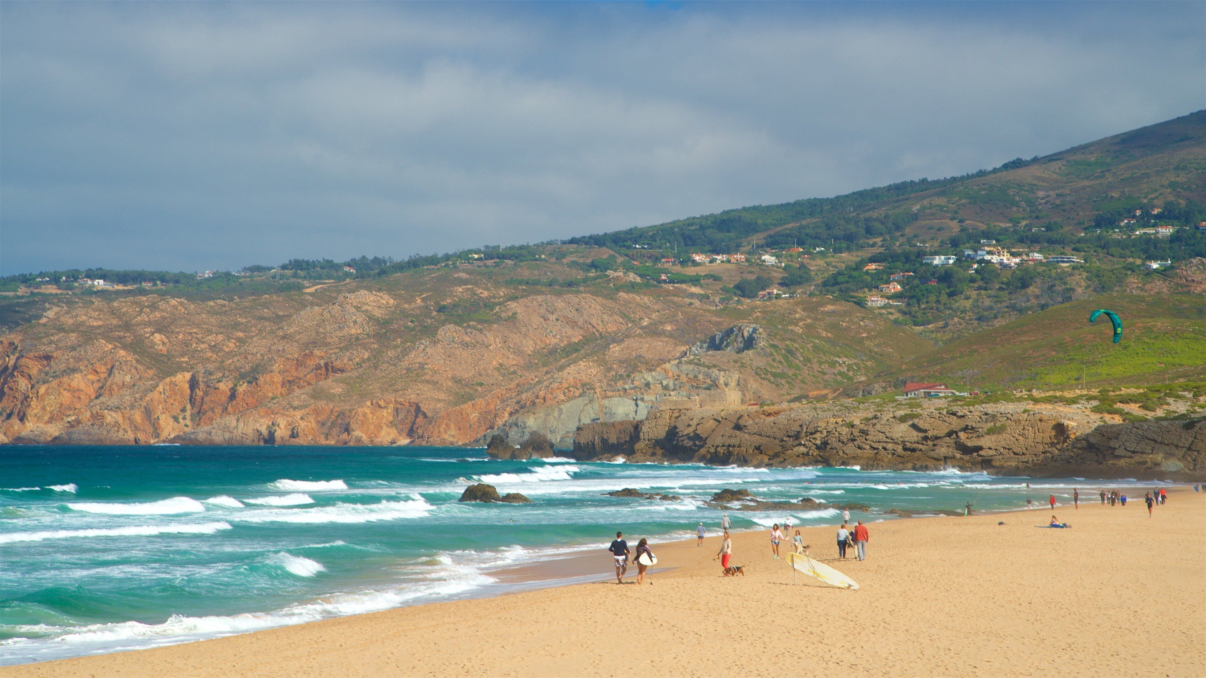 Guincho Beach showing general coastal views, tranquil scenes and a sandy beach