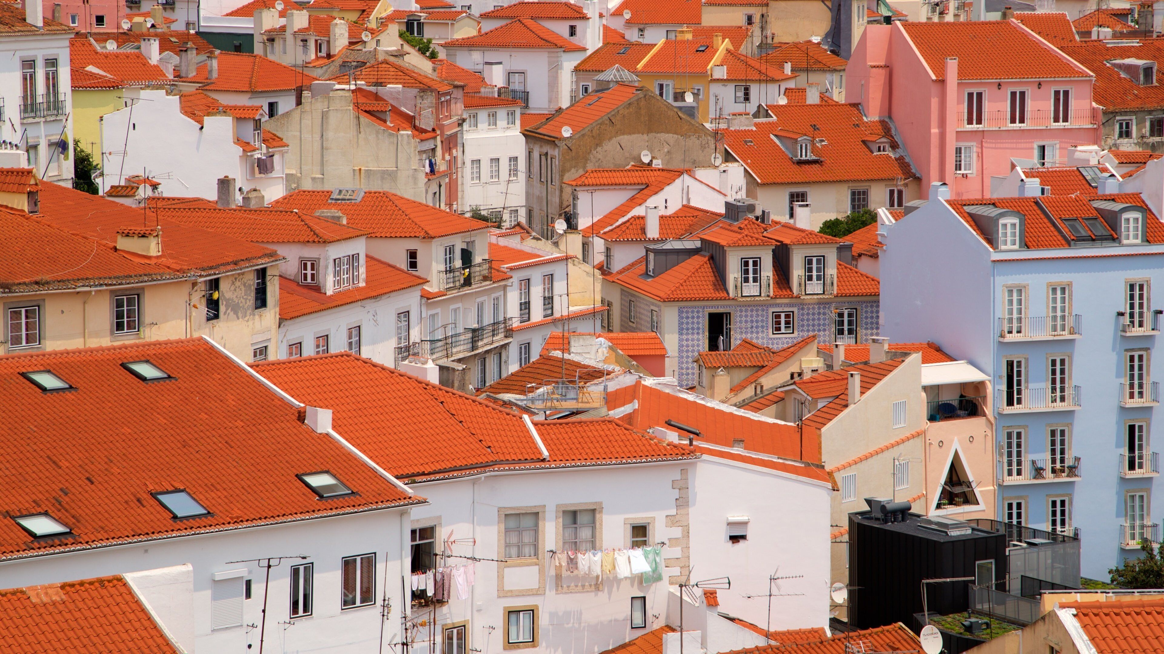 Miradouro de Santa Luzia which includes a city and landscape views