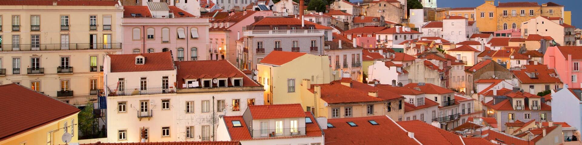 A historic cityscape with prominent churches and colorful buildings.