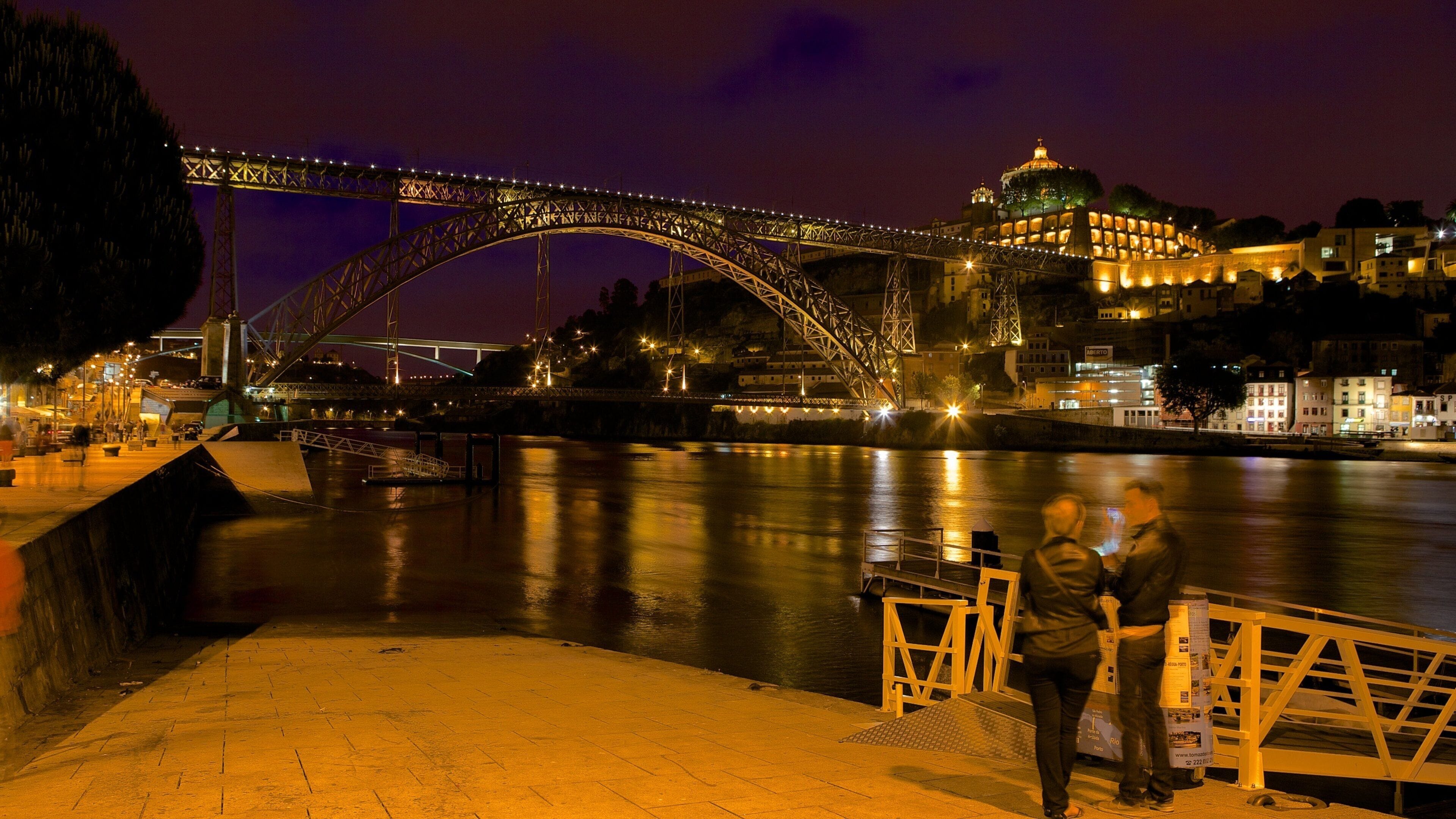 Dom Luis I Bridge which includes a river or creek, a bay or harbor and modern architecture