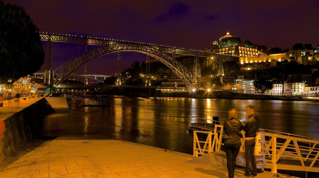 Dom Luis I Bridge which includes a river or creek, a bay or harbor and modern architecture