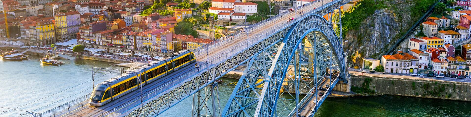 Porto, Portugal cityscape on the Douro River and Dom Luis I Bridge.