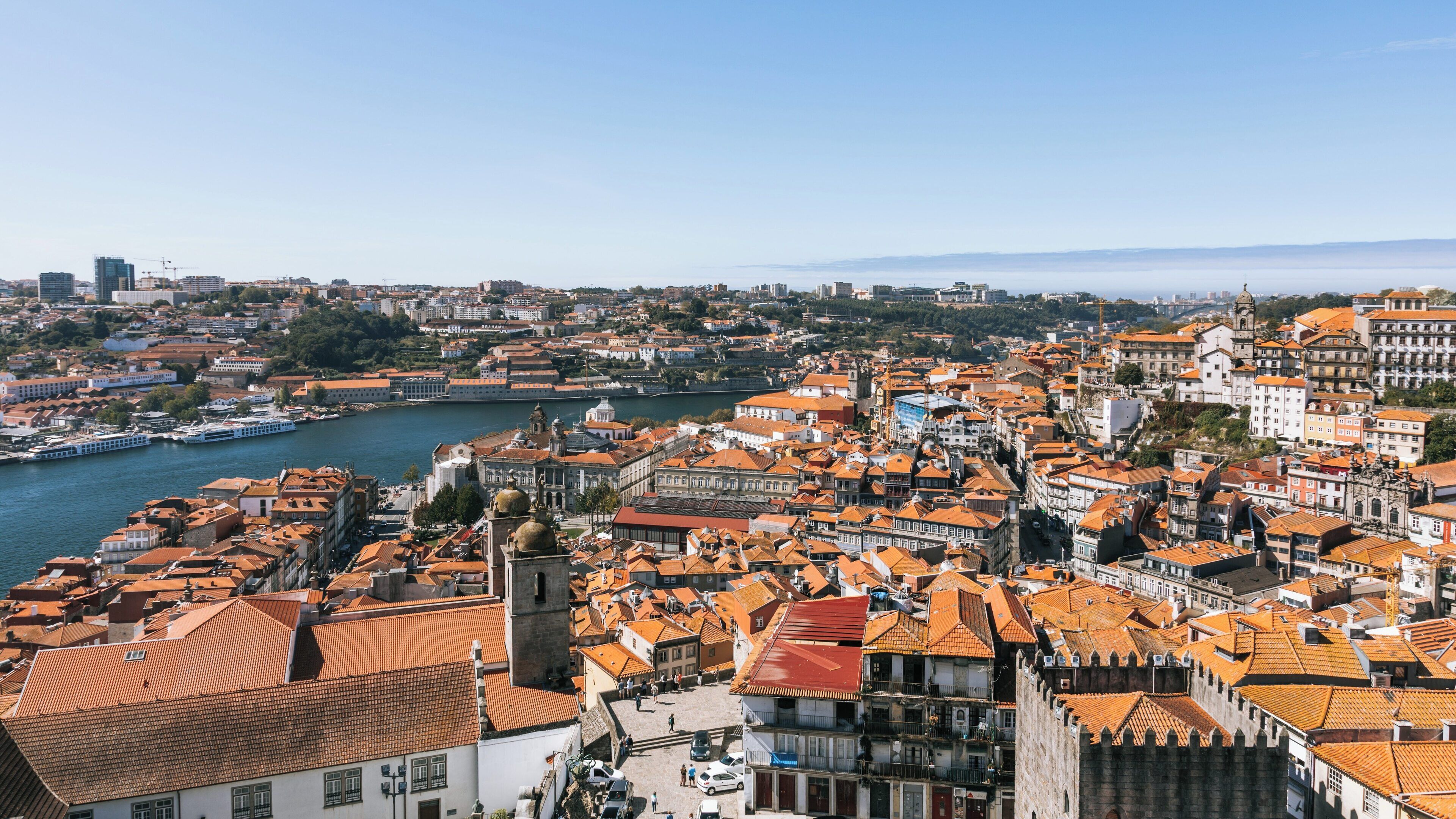 Porto Cathedral stands as a historic landmark overlooking the vibrant rooftops and scenic riverside of Porto, Portugal