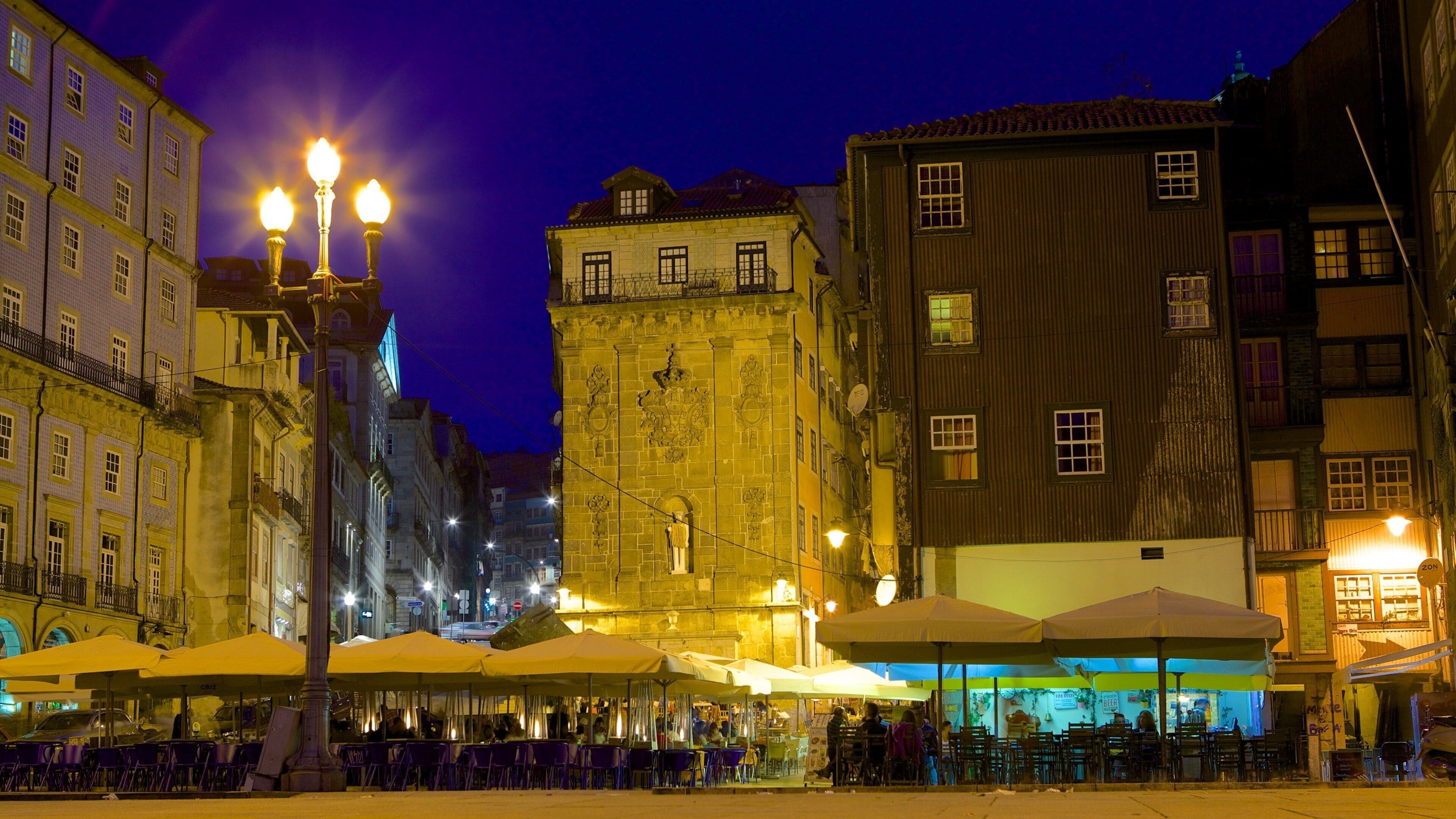 Ribeira Square showing nightlife, a house and night scenes
