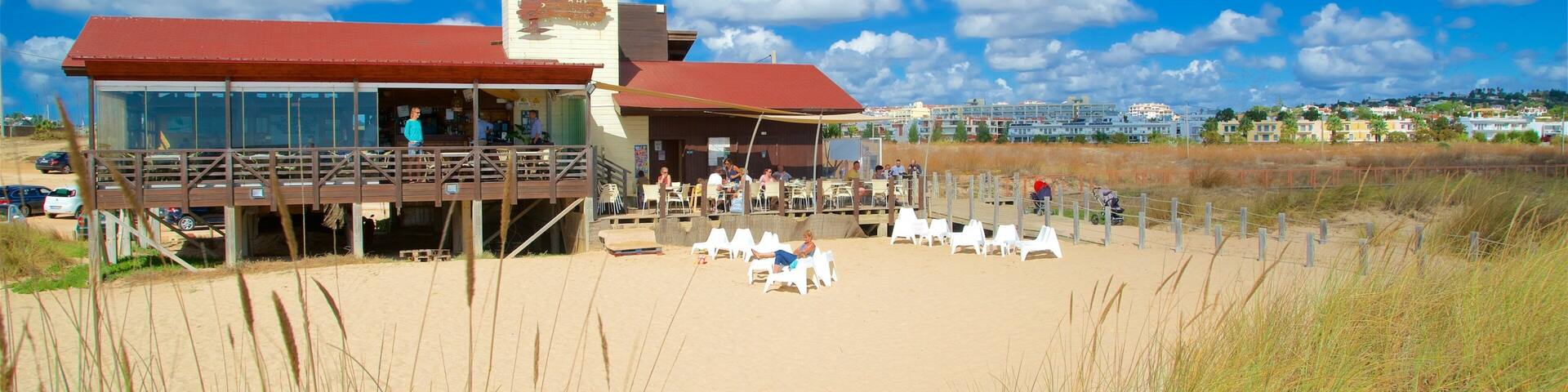 Meia Praia Beach which includes a beach