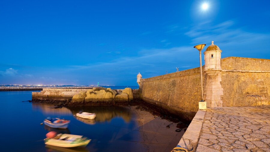 Lagos featuring night scenes and a bay or harbour