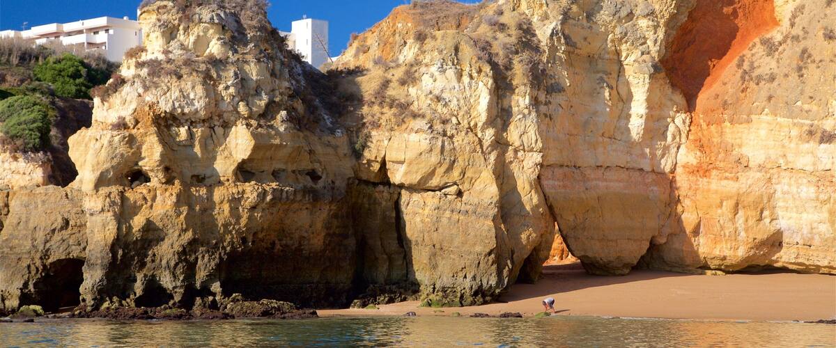 Batata Beach showing a beach, rocky coastline and general coastal views