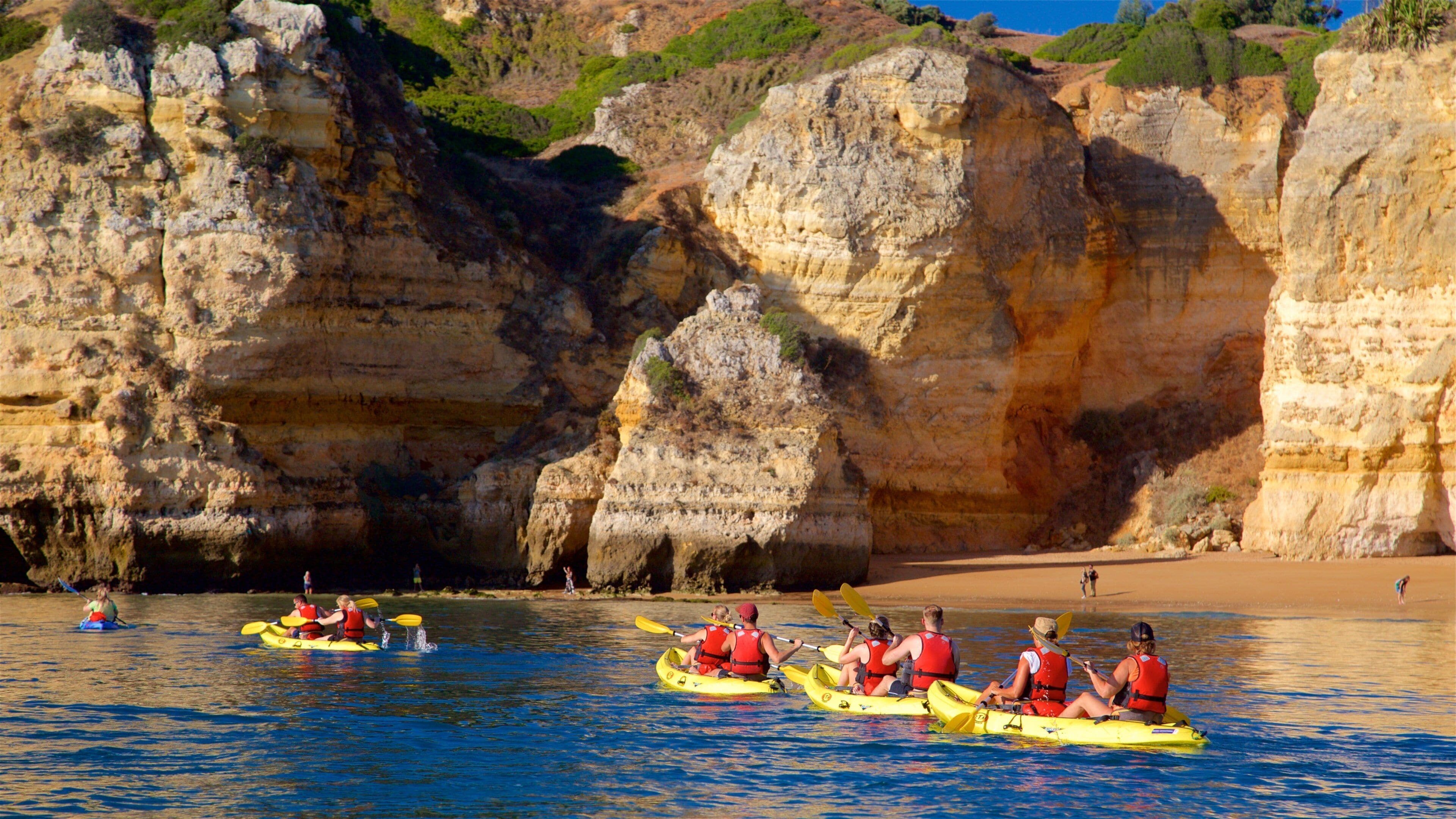 Dona Ana Beach which includes general coastal views, rocky coastline and kayaking or canoeing