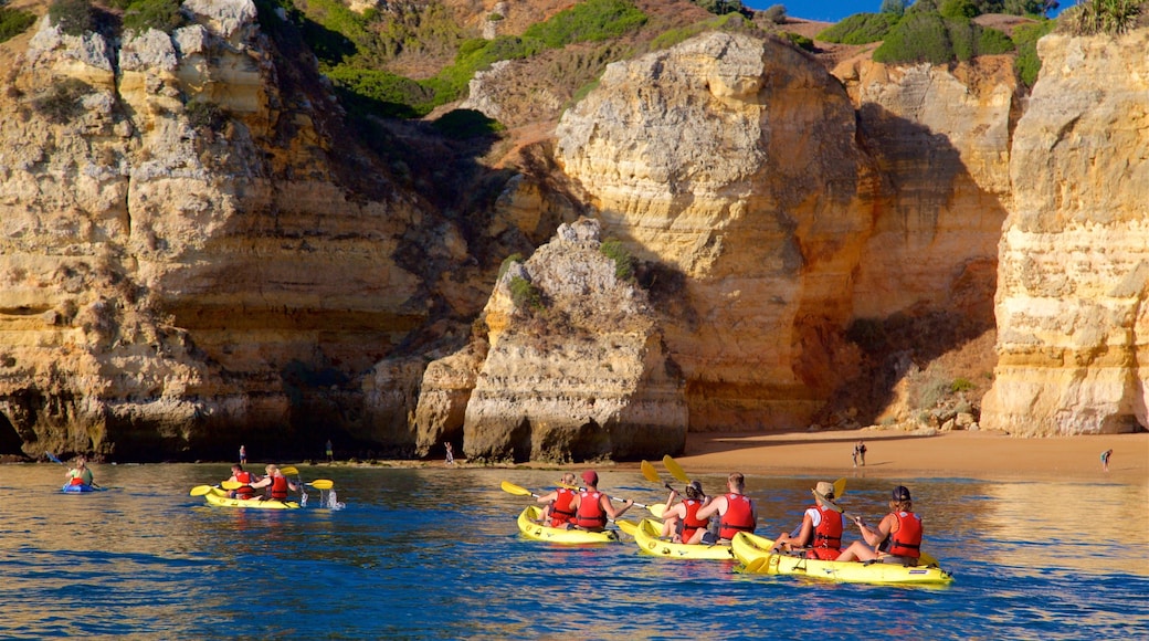 Dona Ana Beach which includes general coastal views, rocky coastline and kayaking or canoeing