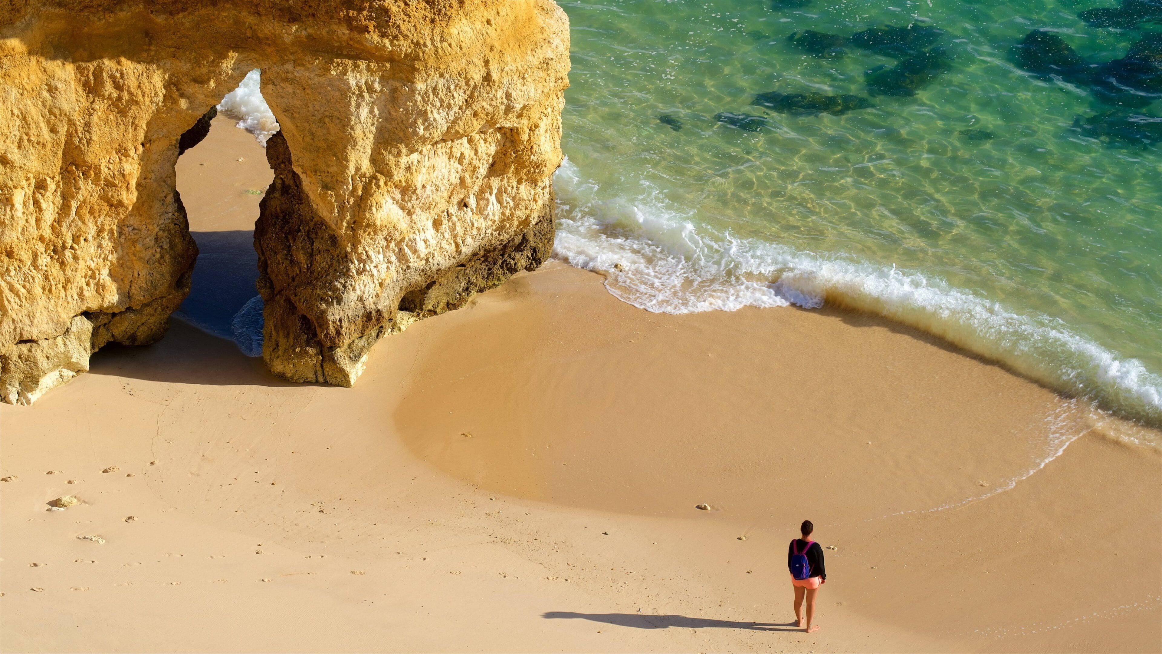 Camilo Beach showing general coastal views, a beach and rugged coastline