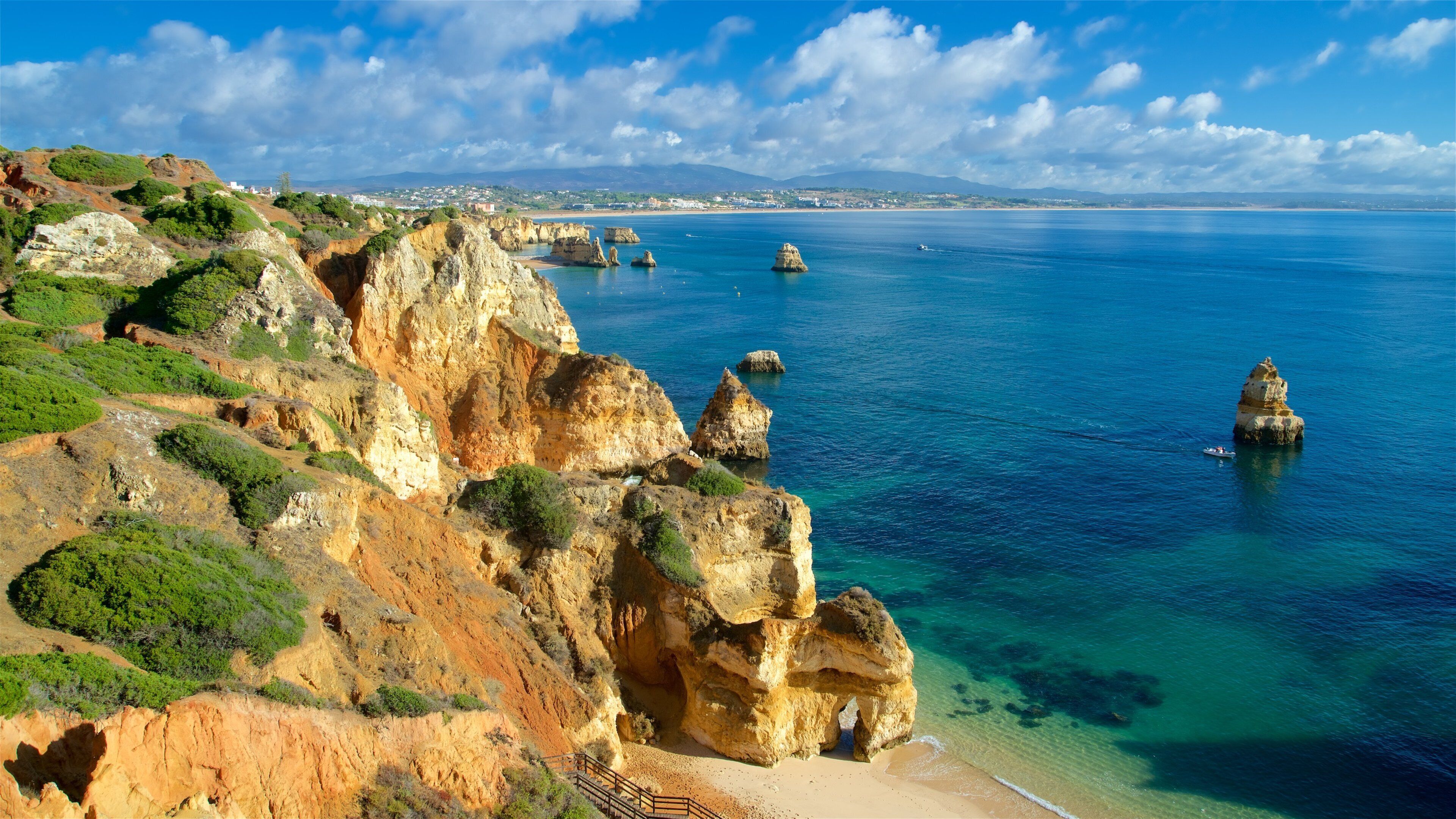 Camilo Beach featuring general coastal views, rocky coastline and a beach