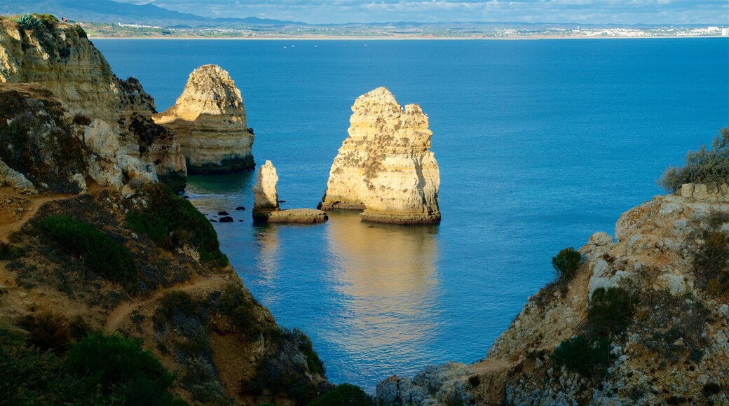 Lagos Lighthouse showing rugged coastline and general coastal views
