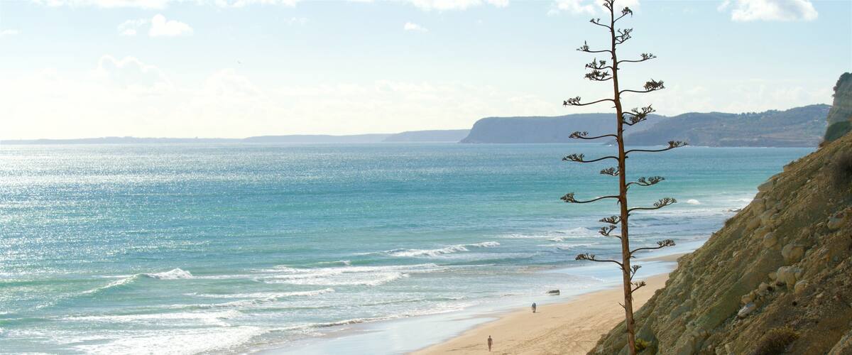 Porto de Mos Beach featuring a beach and general coastal views