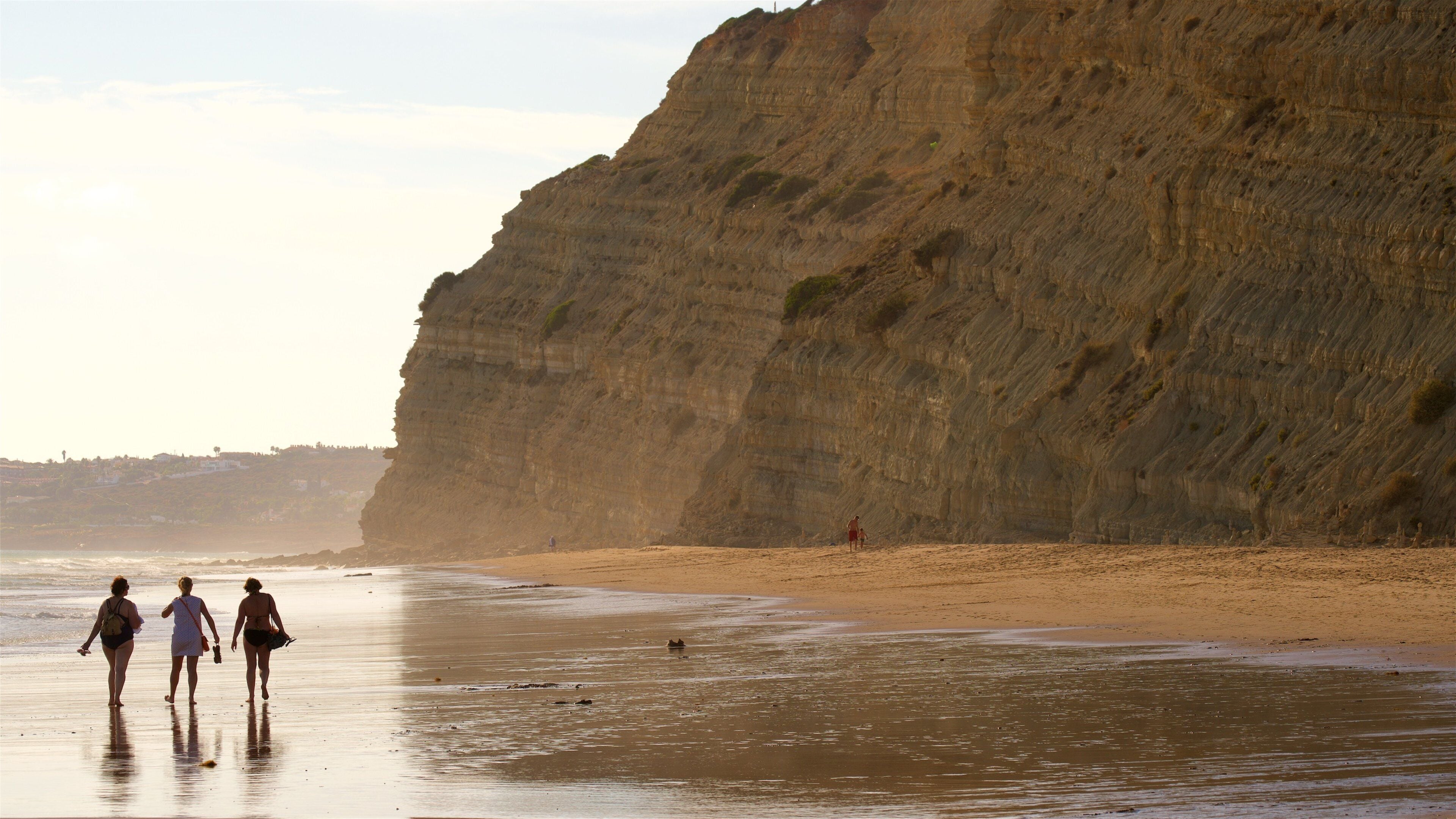 Porto de Mos Beach featuring a beach, rugged coastline and general coastal views