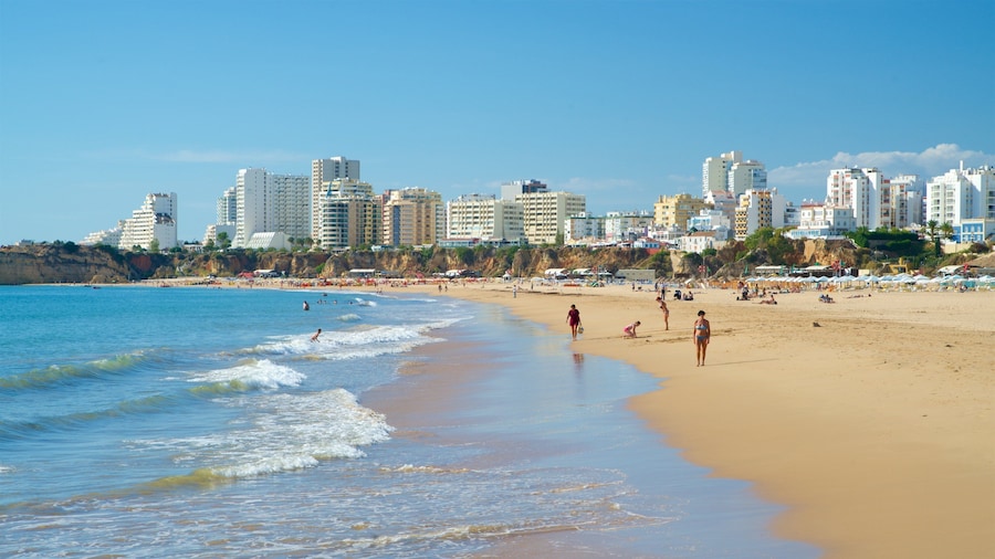 Rocha Beach featuring a city, a coastal town and a sandy beach