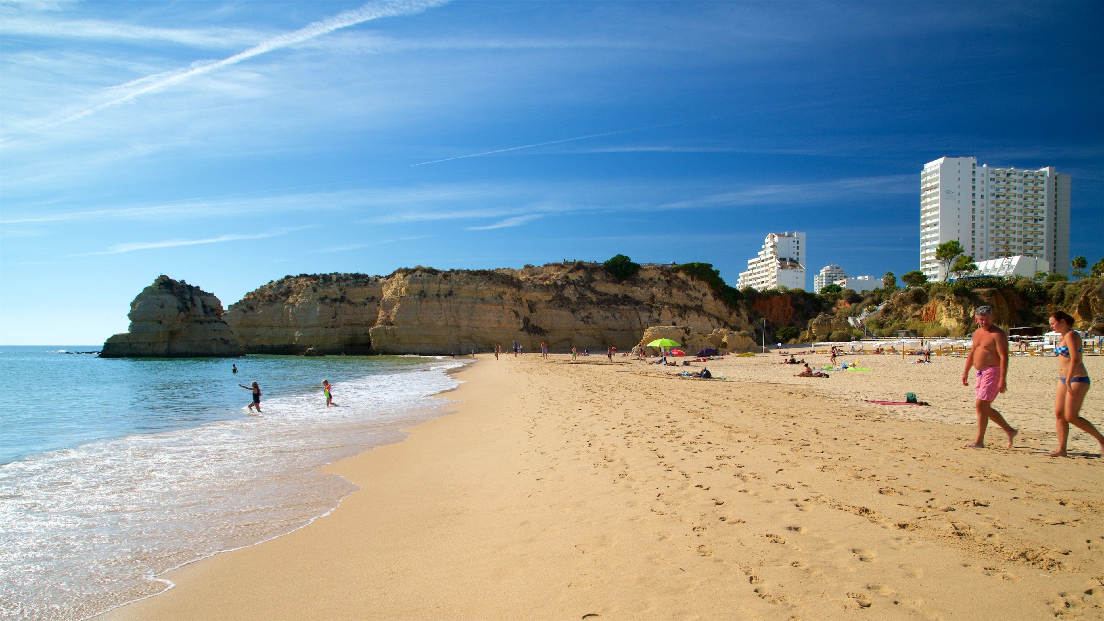 Rocha Beach showing a sandy beach, rugged coastline and general coastal views