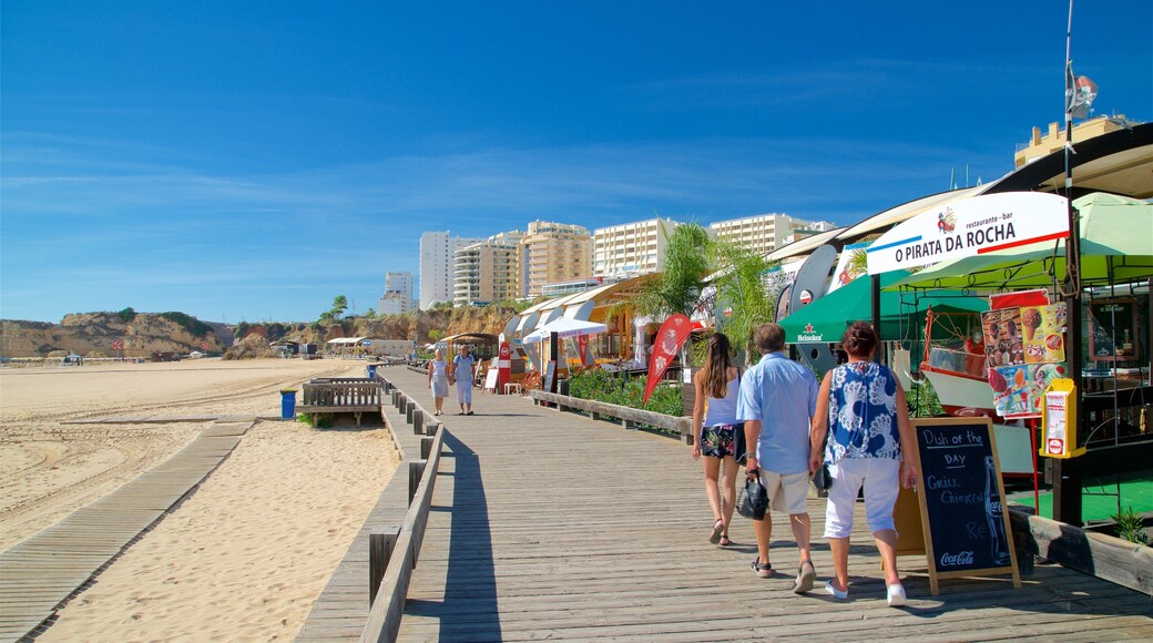 Rocha Beach featuring a coastal town, a sandy beach and general coastal views