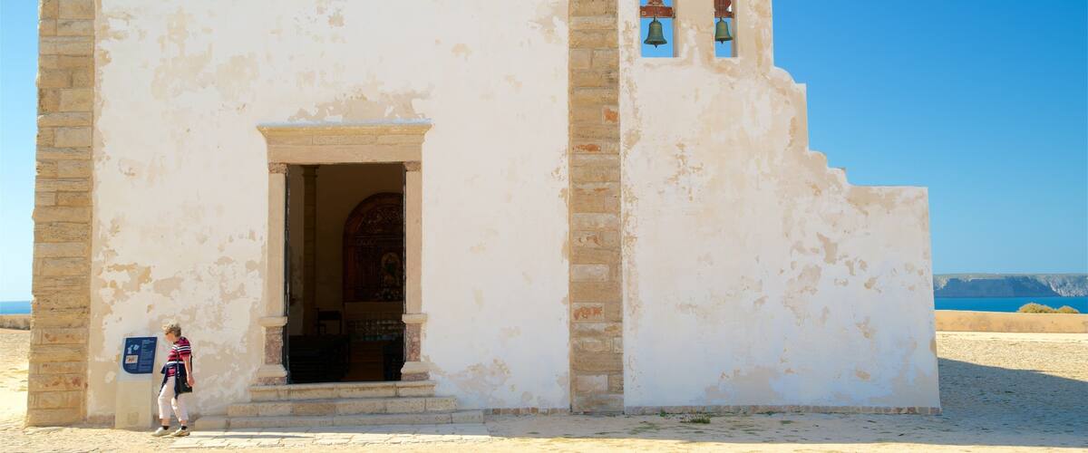 Sagres Fortress showing heritage elements as well as an individual femail