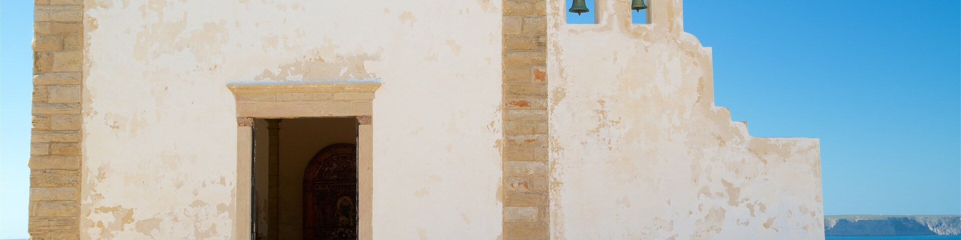 Sagres Fortress showing heritage elements as well as an individual femail
