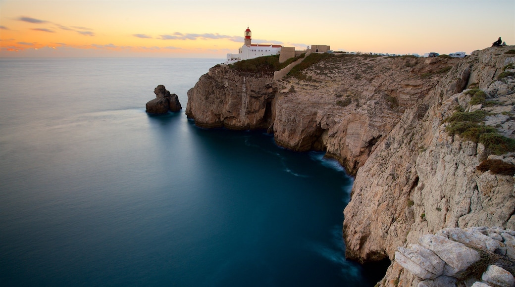 Cape St. Vincent Lighthouse featuring a sunset, general coastal views and a lighthouse