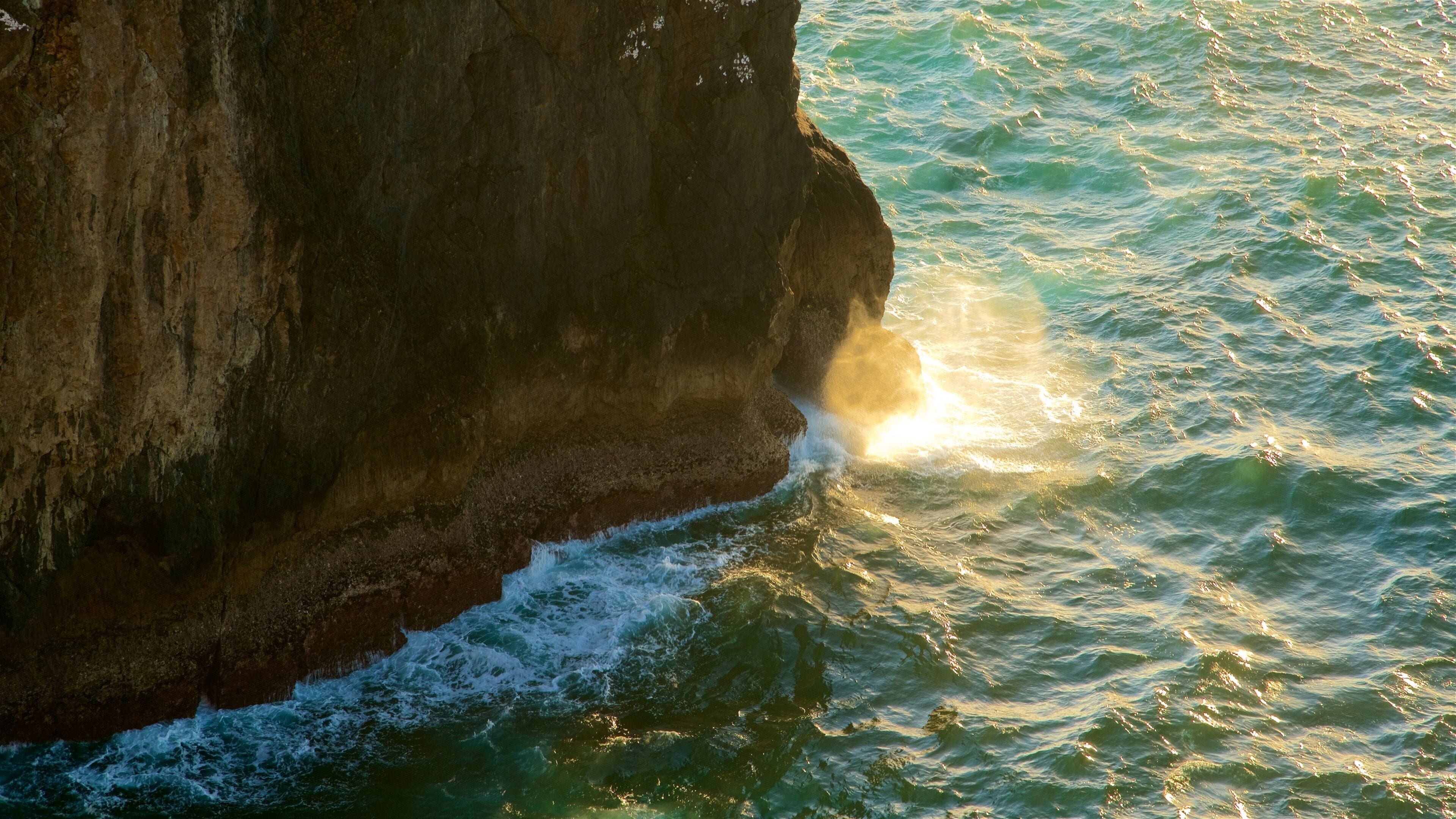 Cape St. Vincent Lighthouse featuring rugged coastline, general coastal views and a sunset