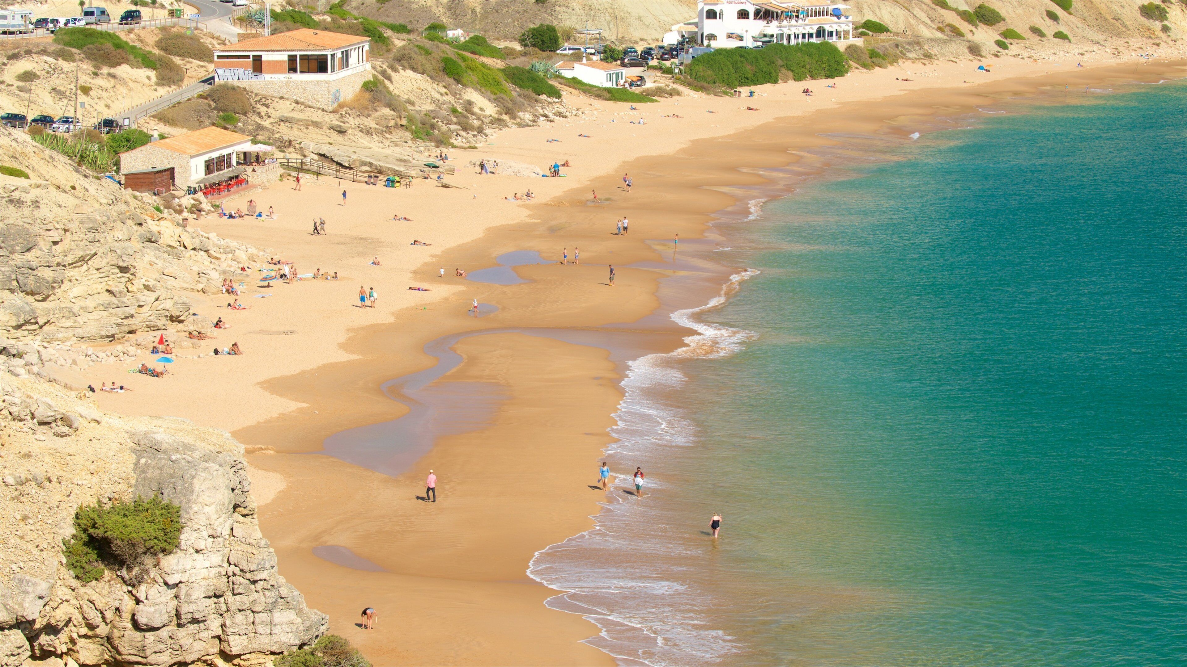 Playa de Mareta que incluye una playa y vistas de una costa