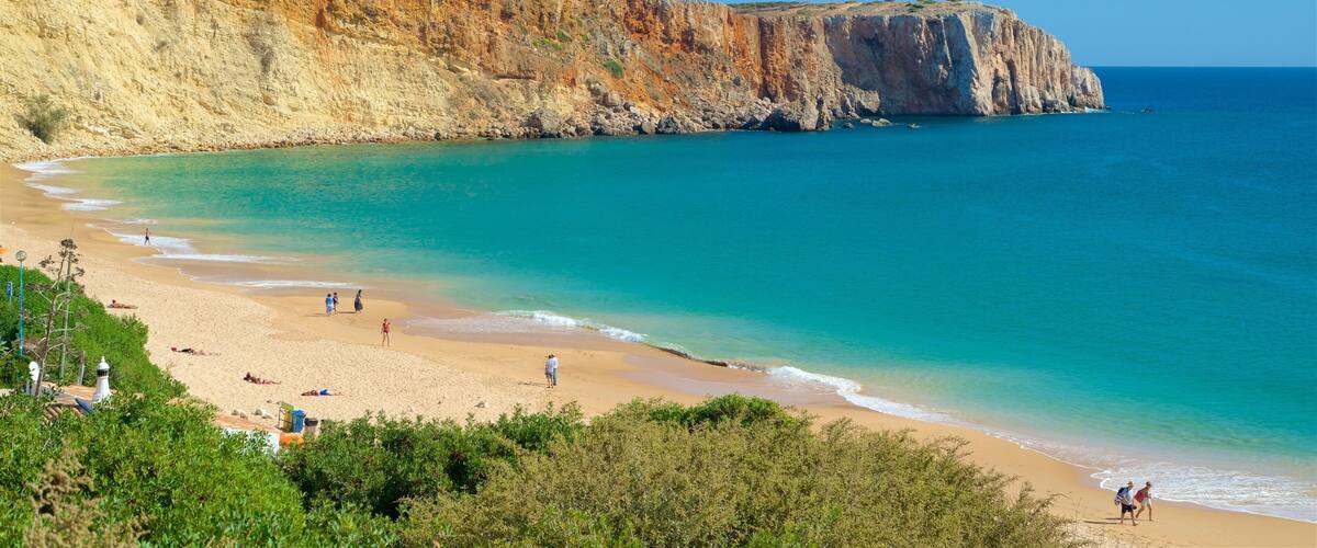 Mareta Beach showing rocky coastline, general coastal views and a sandy beach
