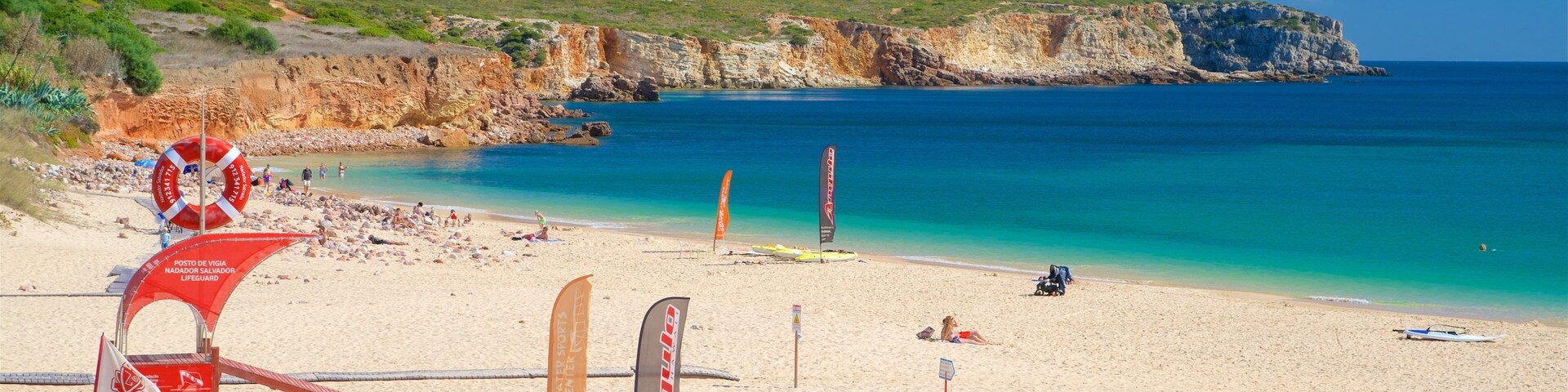 Martinhal Beach which includes a beach, general coastal views and rocky coastline