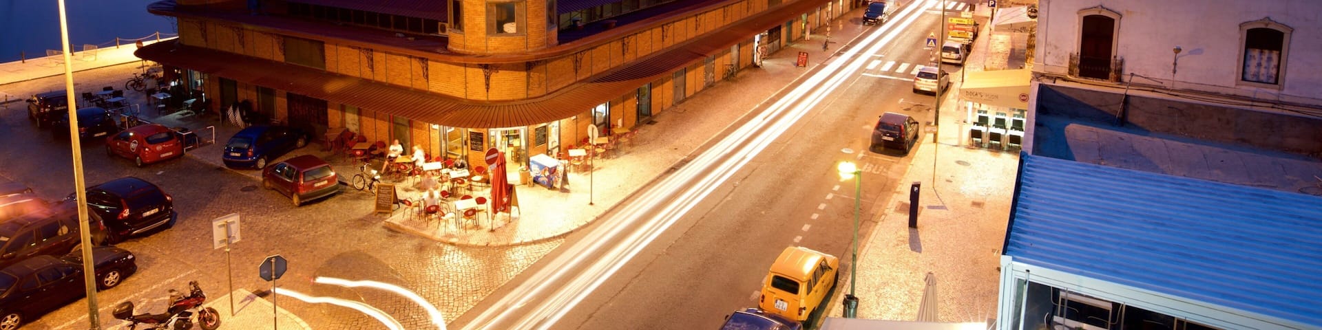 Olhao Municipal Market showing a sunset and night scenes