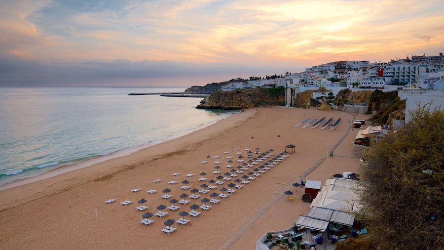 Fisherman\'s Beach featuring a coastal town, general coastal views and a sunset