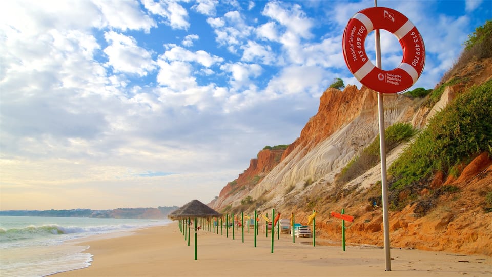 Falesia Beach showing a beach, general coastal views and rocky coastline