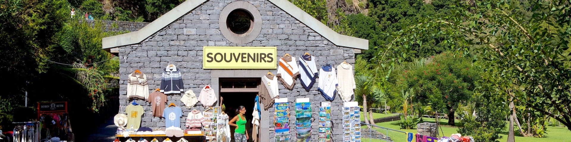 Caves of Sao Vicente and Volcanism Center featuring signage and shopping