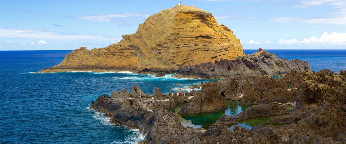Porto Moniz Natural Pools featuring rocky coastline