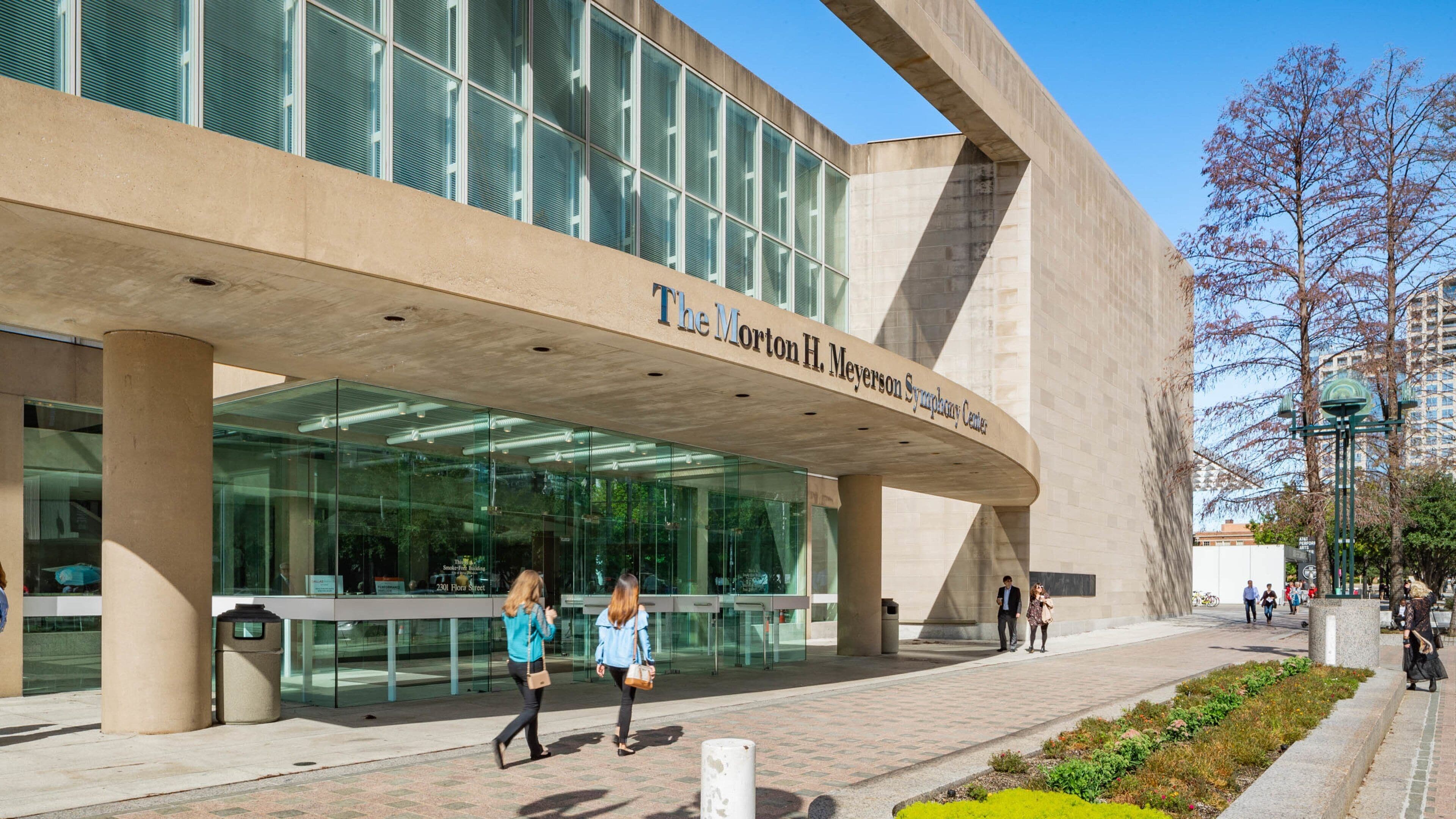Morton H. Meyerson Symphony Center which includes signage as well as a couple