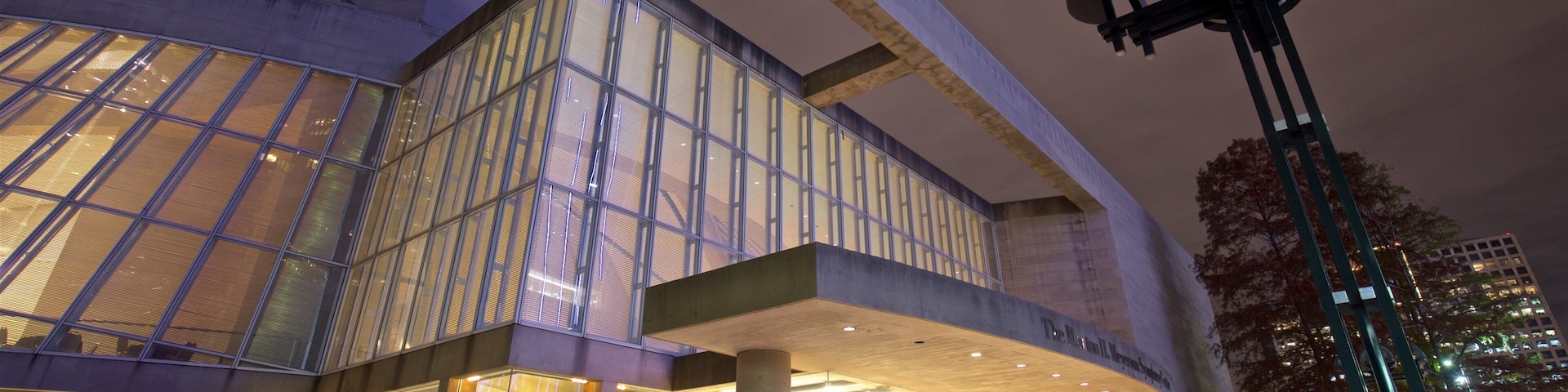 Morton H. Meyerson Symphony Center featuring modern architecture and night scenes