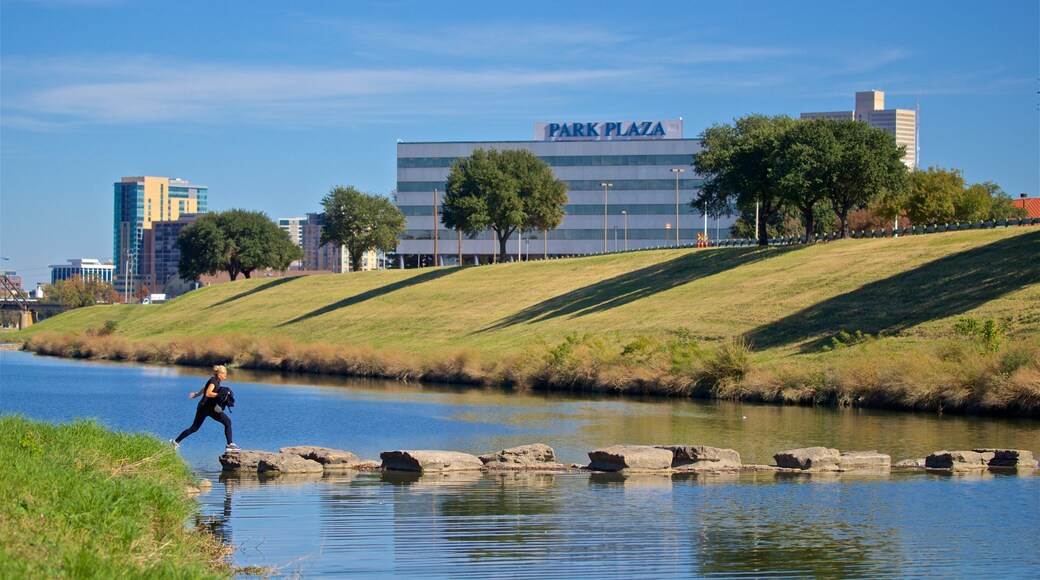 Trinity Park featuring a river or creek as well as an individual female