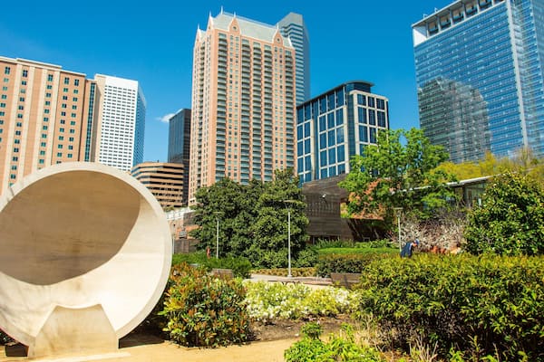 Discovery Green featuring a garden, a city and a skyscraper