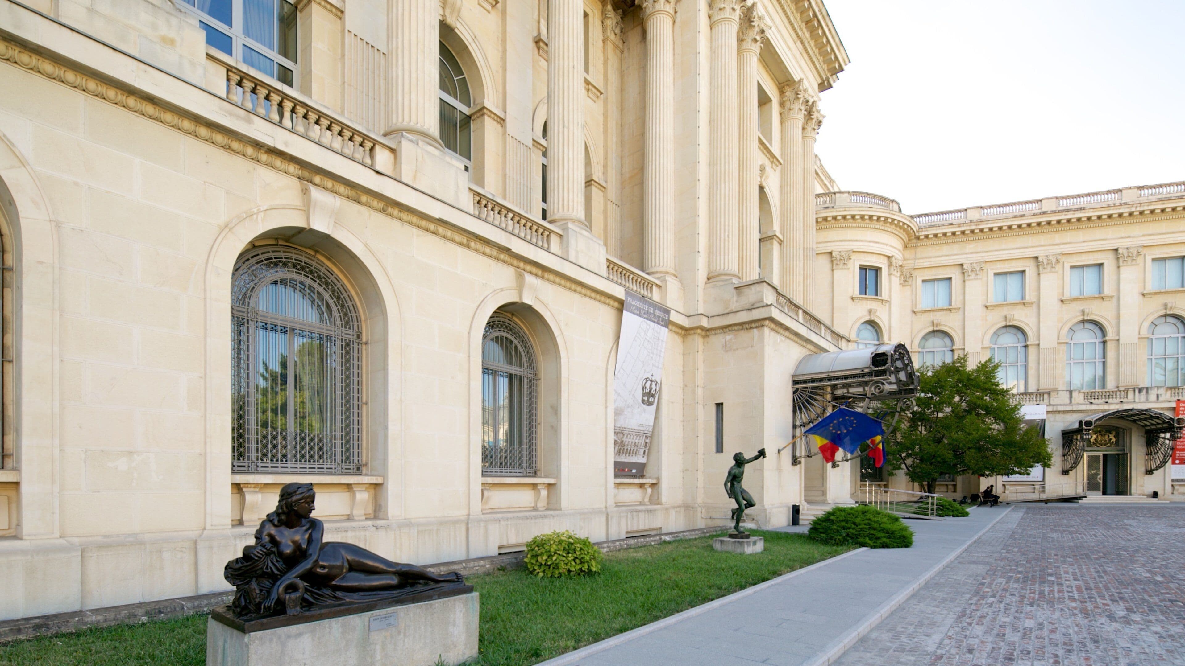 National Museum of Art of Romania featuring a statue or sculpture and heritage architecture