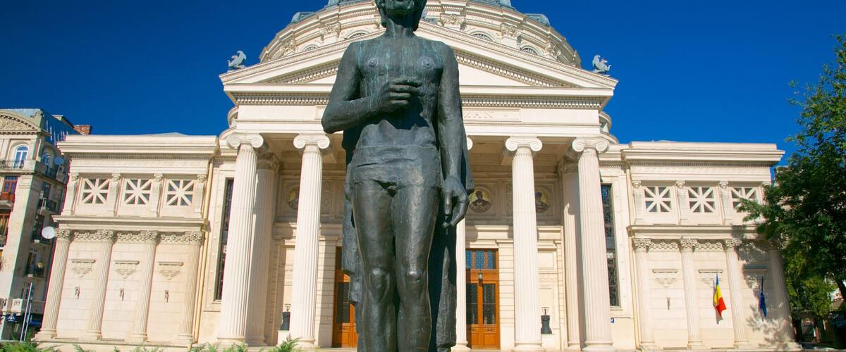 Romanian Athenaeum showing theatre scenes, heritage architecture and a statue or sculpture