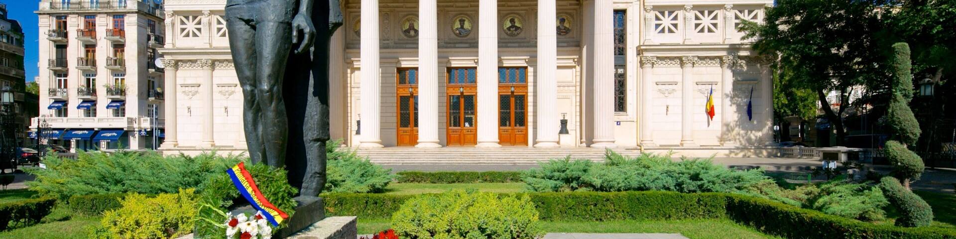 Romanian Athenaeum showing heritage architecture, a park and theater scenes