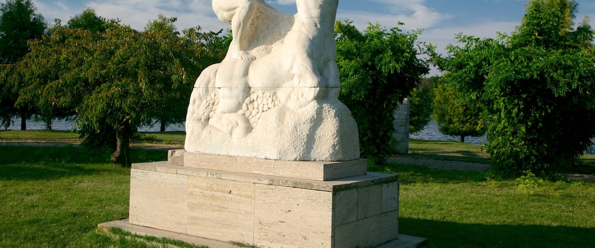 Herastrau Park featuring a garden, outdoor art and a statue or sculpture
