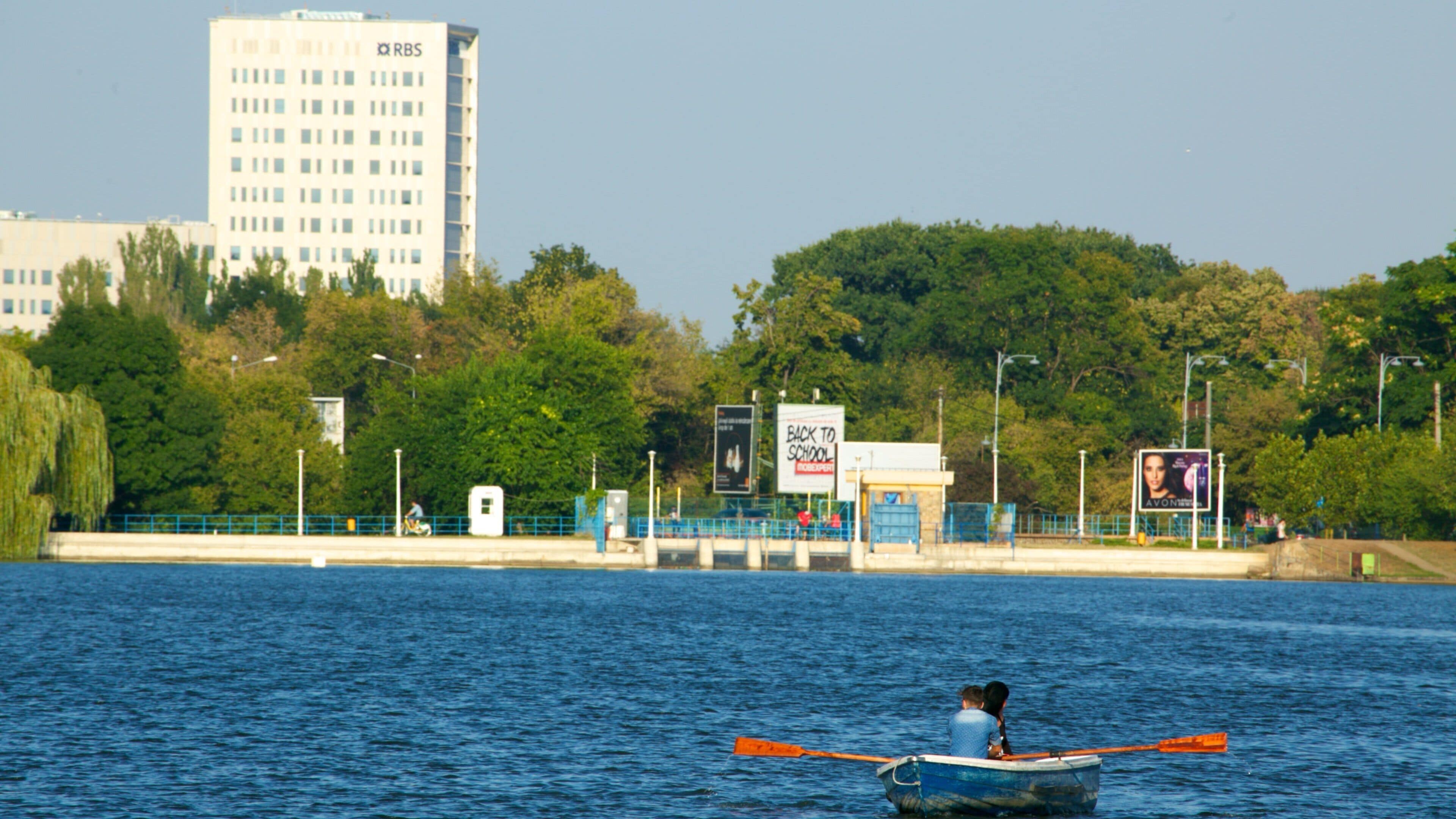 Herastrau Park featuring kayaking or canoeing and a lake or waterhole