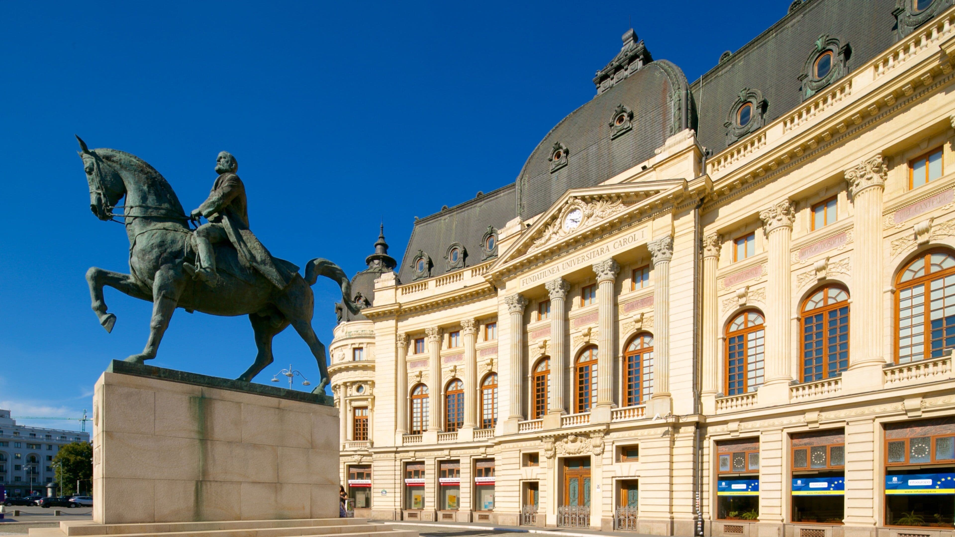 Bucharest which includes heritage architecture and a statue or sculpture