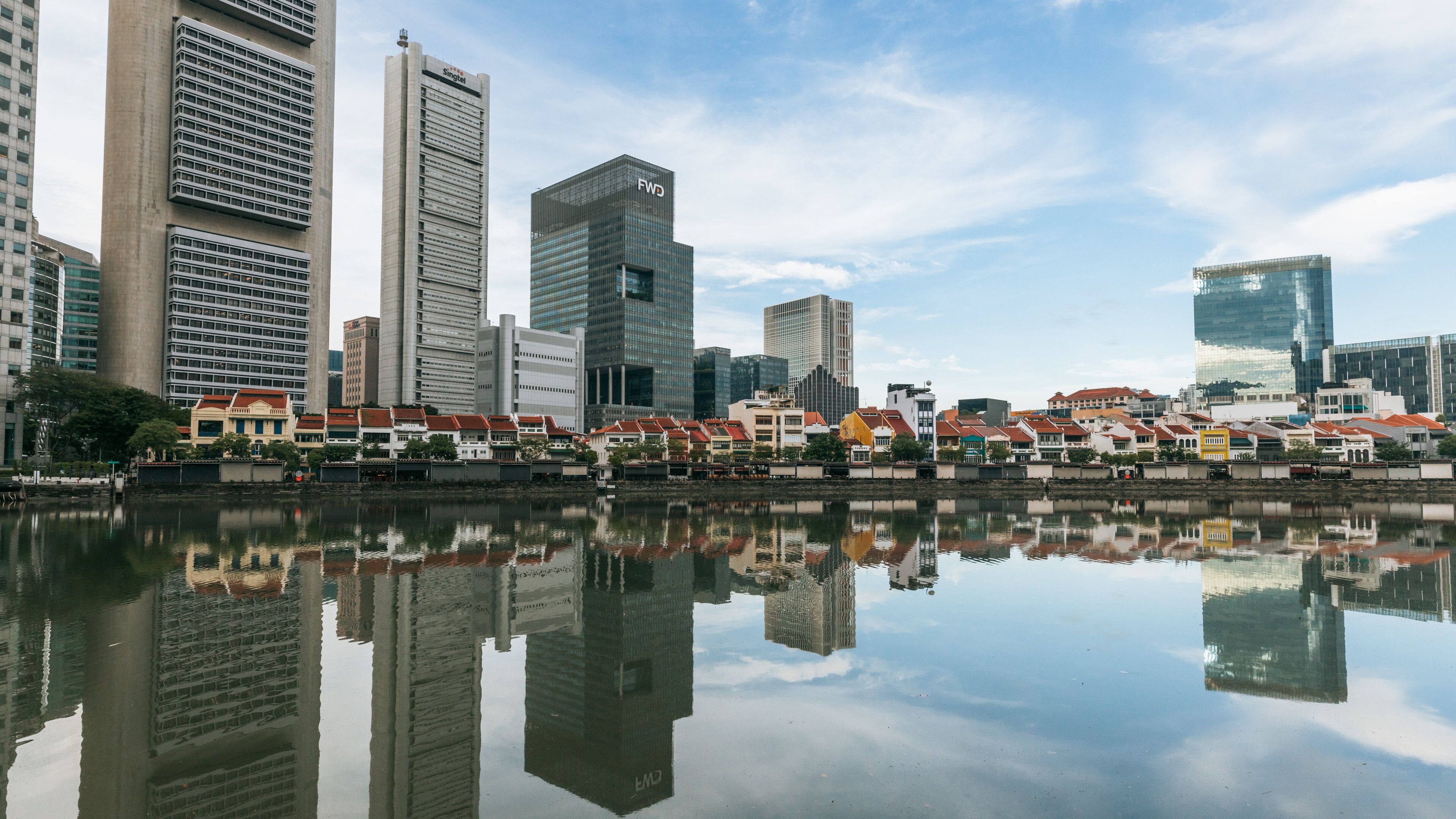 Boat Quay which includes a city and a bay or harbor