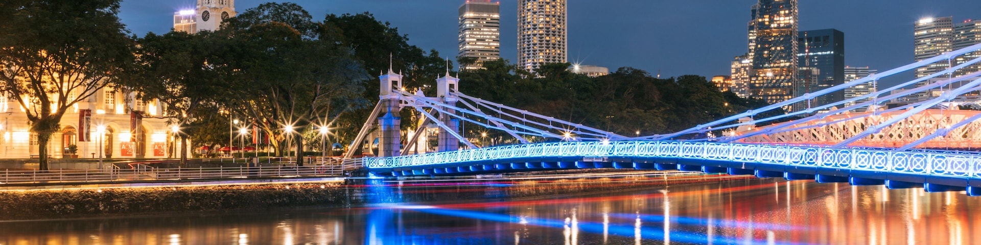 Cavenagh Bridge which includes a bridge, night scenes and a river or creek