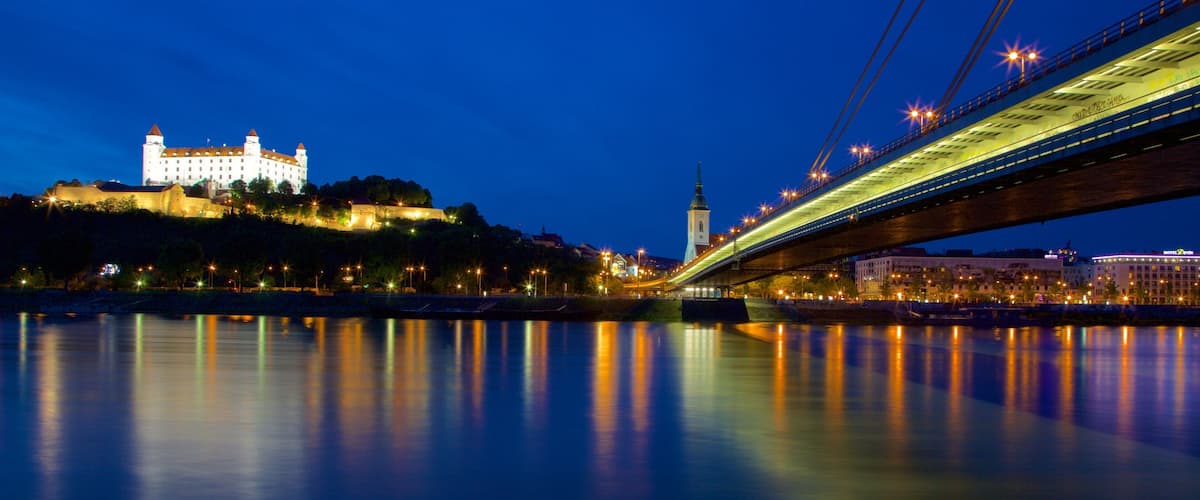 New Bridge showing night scenes, a bridge and a river or creek