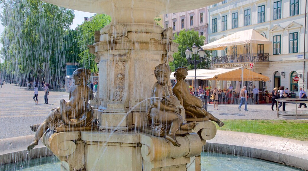 Hviezdoslavovo Square which includes a fountain, a statue or sculpture and a square or plaza