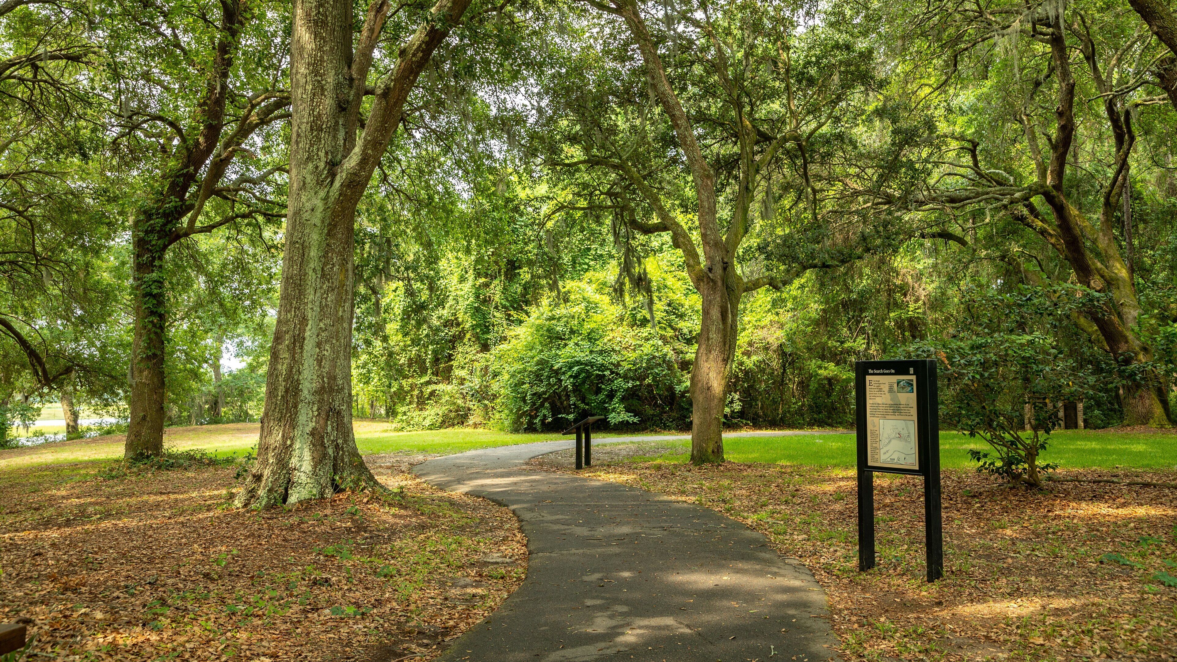 Charles Towne Landing State Historic Site featuring signage, fall colors and a garden