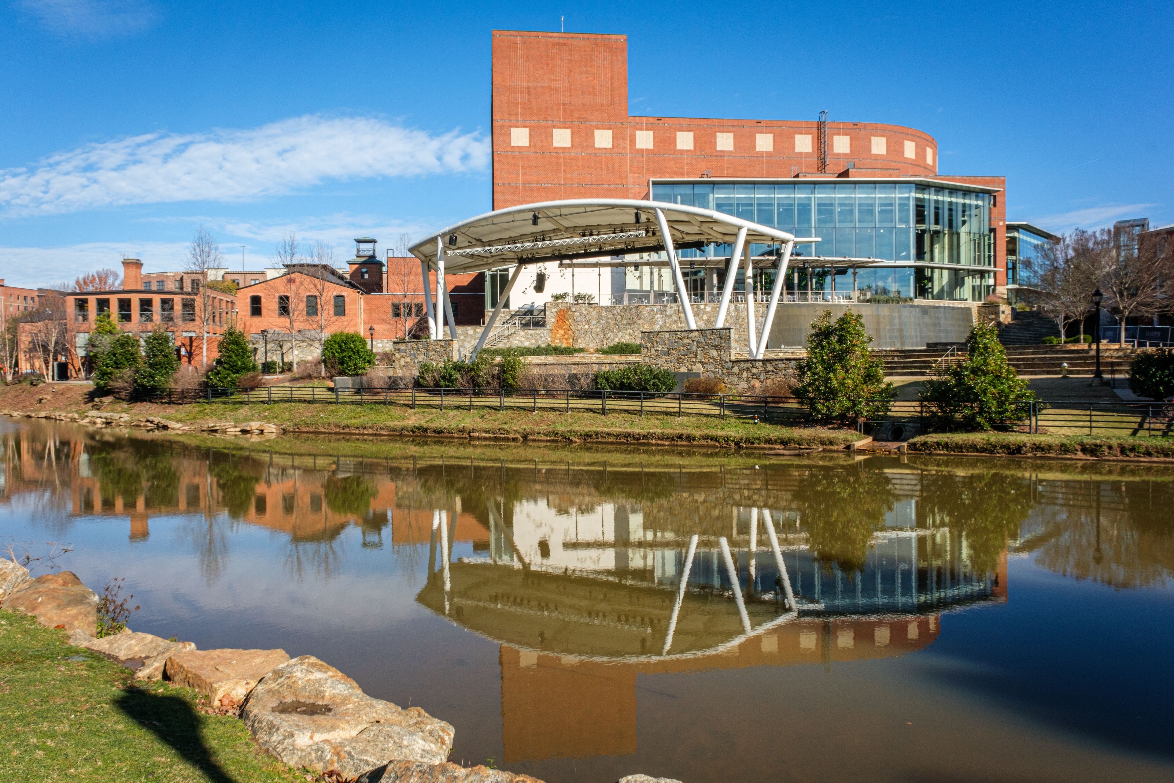 The Peace Center, performing arts center and outdoor ampitheater, in Greenville, South Carolina downtown viewed from the Reedy River.